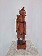 Houten beeld van een wijze man met vis, Ophalen of Verzenden