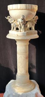 Zuil lamp met olifanten, Ophalen