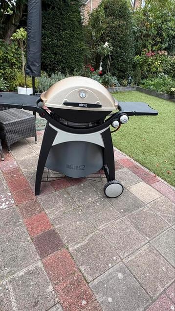 Te koop goede Weber Q300 dubbele brander en accessoires beschikbaar voor biedingen