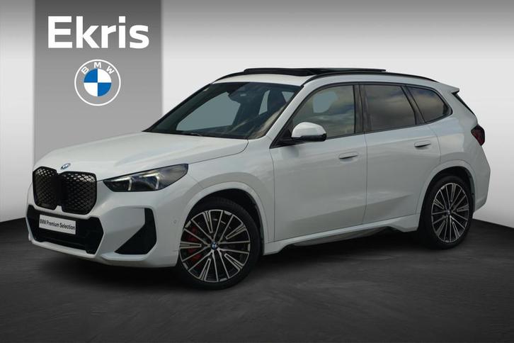 BMW iX1 eDrive20 M Sport Pro | Trekhaak / Head-up / Harman K, Auto's, BMW, Bedrijf, Te koop, iX1, Alarm, Bochtverlichting, Dakrails