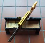 Verstek handzaag, Ophalen