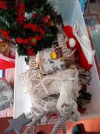 Plastiek bak vol met kerstspullen, Ophalen