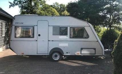 Super nette caravan kip 44 T greyline., Caravans en Kamperen, Caravans, Particulier, tot en met 4, Treinzit, Kip, Fietsenrek, Koelkast