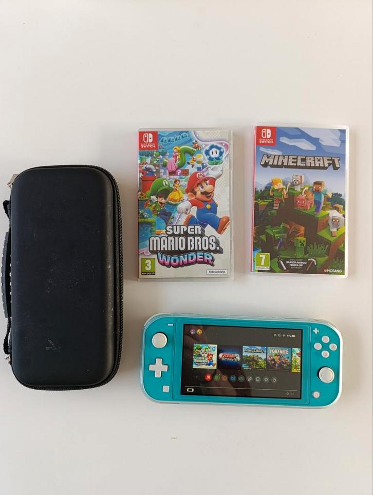 Nintendo Switch Lite + Spellen, Spelcomputers en Games, Games | Nintendo Switch, Gebruikt, Avontuur en Actie, 1 speler, Vanaf 7 jaar