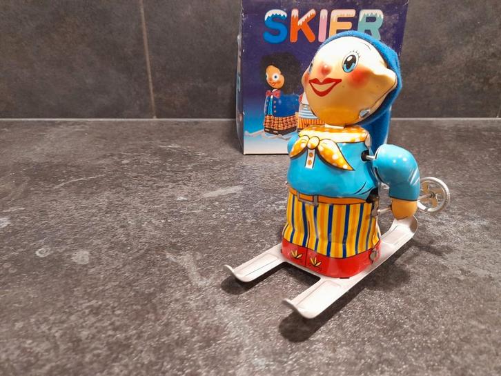 Blikken speelgoed skier, Antiek en Kunst, Antiek | Speelgoed, Ophalen of Verzenden