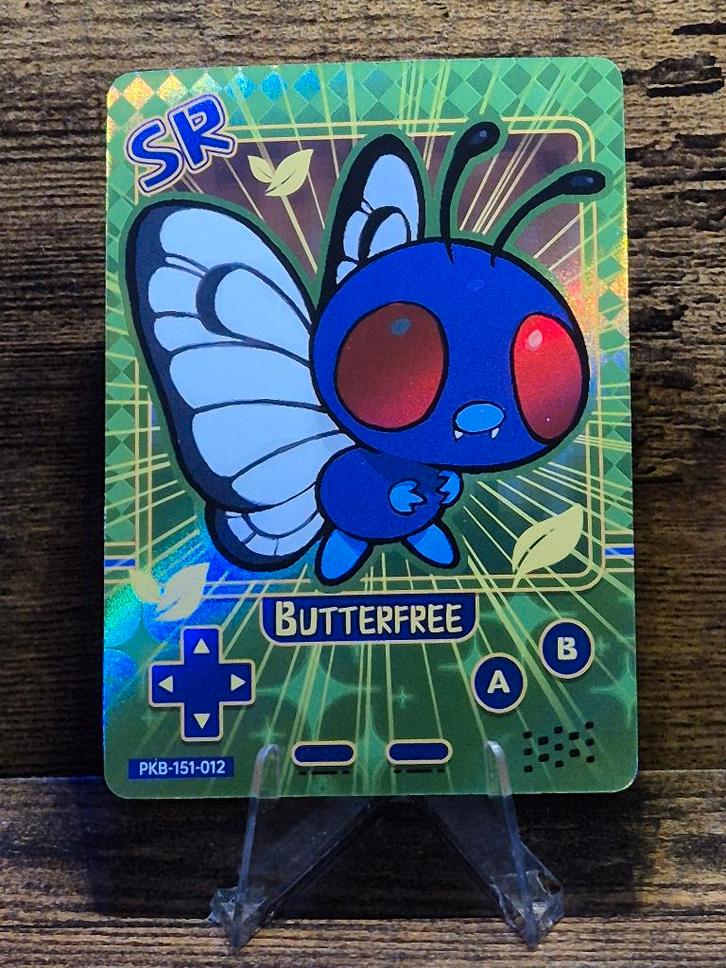 Poké Baby Butterfree 151/012, Hobby en Vrije tijd, Verzamelkaartspellen | Pokémon, Nieuw, Foil, Ophalen of Verzenden