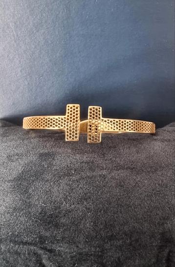 Gouden T armband.  beschikbaar voor biedingen