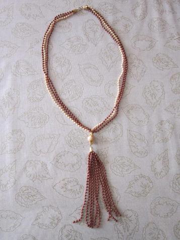 Ketting van kunststof kralen, 70 cm. lang, bruin/beige. beschikbaar voor biedingen