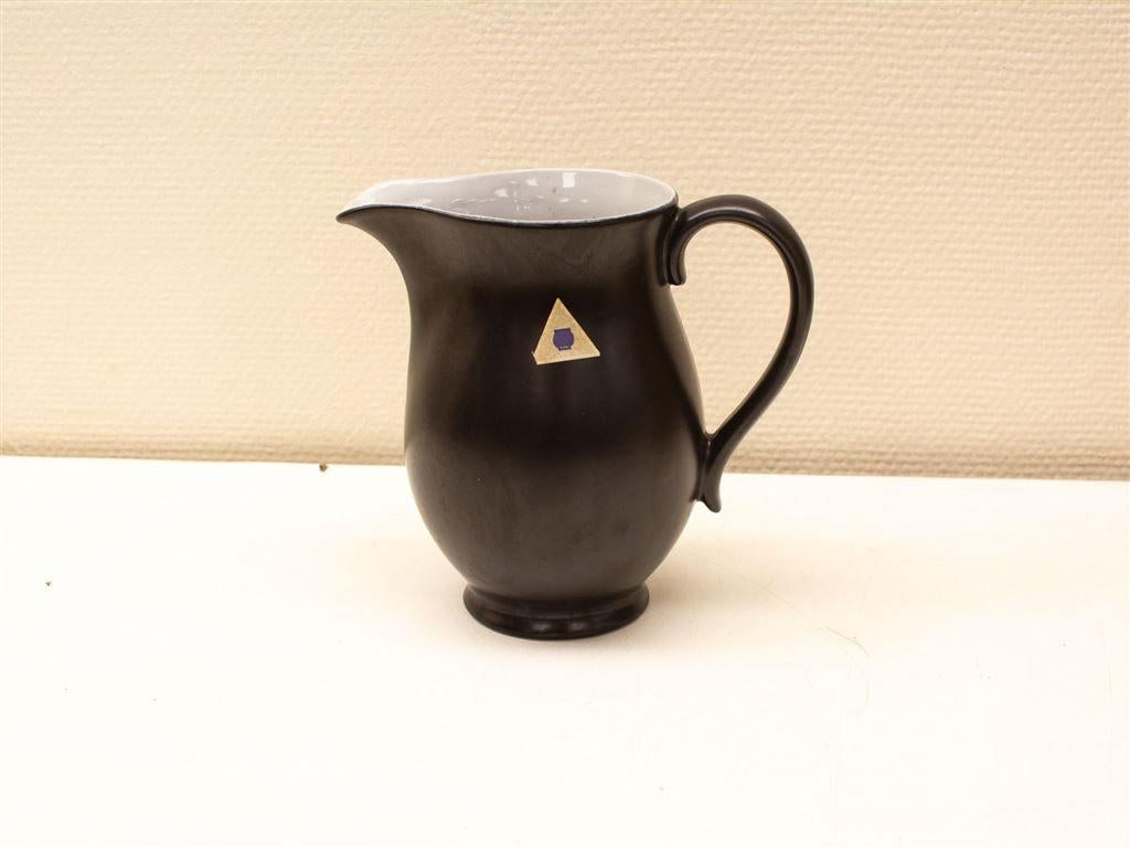 Zwarte stenen kan 29423