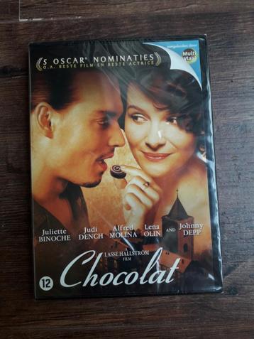 DVD: Chocolat. Naar een roman van Joanne Harris. Boek ook. 
