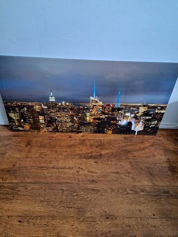 Schilderij Stadsgezicht bij Nacht - Print Canvasdoek  beschikbaar voor biedingen