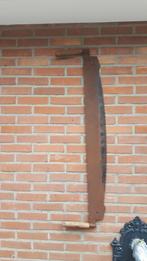 antieke zaag, Ophalen