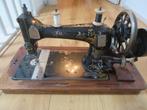 antieke naaimachine Naumann, Ophalen