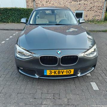 BMW 1-Serie 116I 5drs leder navi airco cc trekhaak  bj 2013  beschikbaar voor biedingen