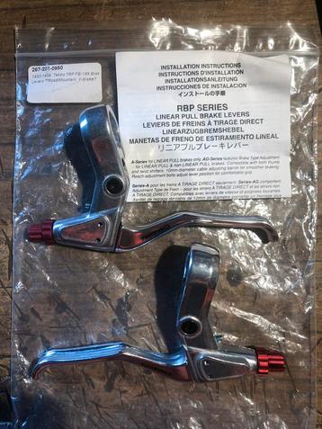 Twee Tektro rem handgrepen (nieuw) beschikbaar voor biedingen