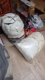 Oude dekbedden, kussens en dekens, Ophalen