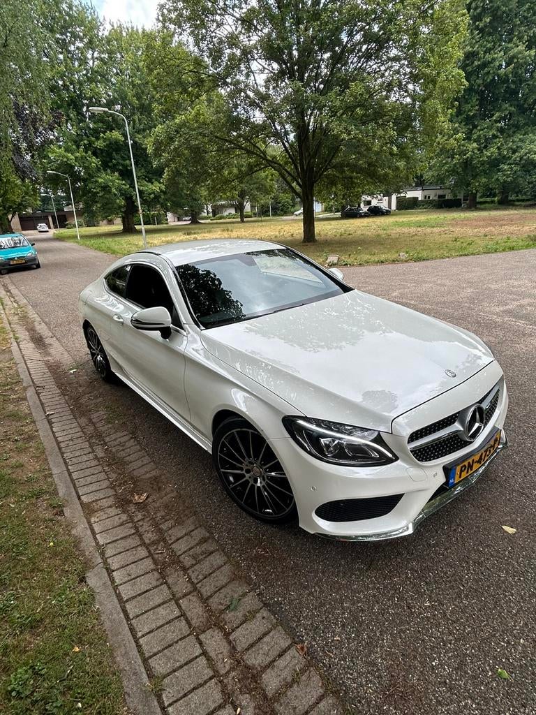 Mercedes-Benz C-Klasse C180 Coupe 7G-TR+ 2016 Wit, Automaat, Achterwielaandrijving, 1800 kg, Zwart