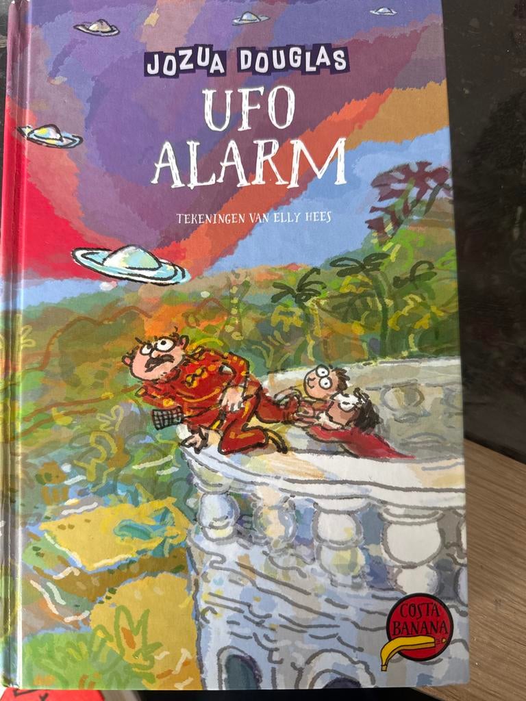 Jozua Douglas - UFO Alarm (Costa Banana), Boeken, Ophalen of Verzenden, Zo goed als nieuw, Fictie algemeen