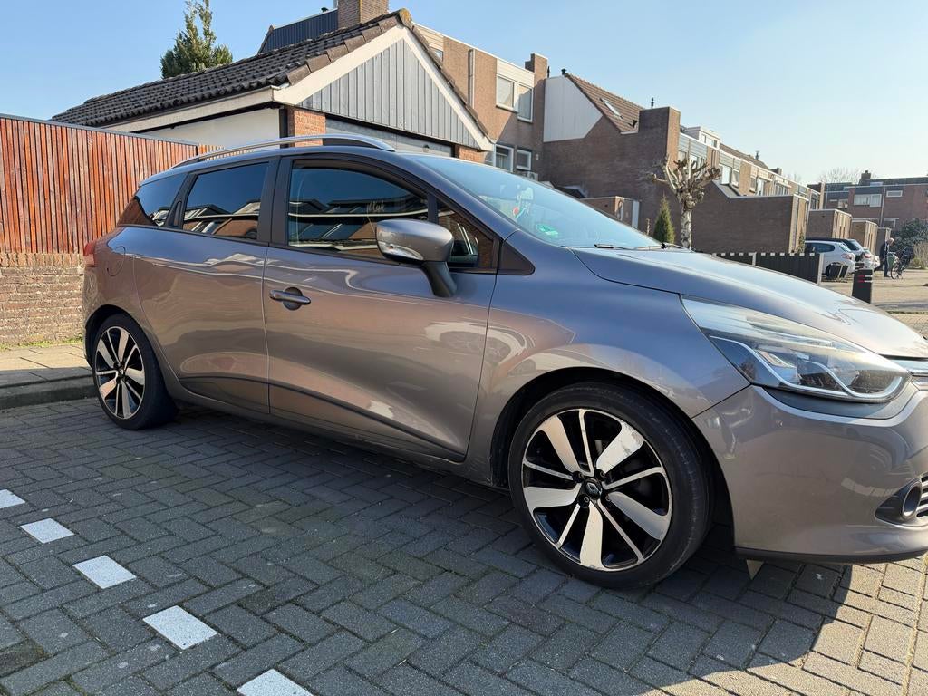 Renault Clio 1.5 DCI 66KW Estate 2014 Grijs, Auto's, Voorwielaandrijving, 4 cilinders, 1096 kg, Origineel Nederlands