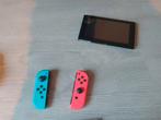 Nintendo Switch met Neon Blue/Red Joy-Cons & twee spellen, Spelcomputers en Games, Gebruikt, Met 2 controllers, Ophalen of Verzenden