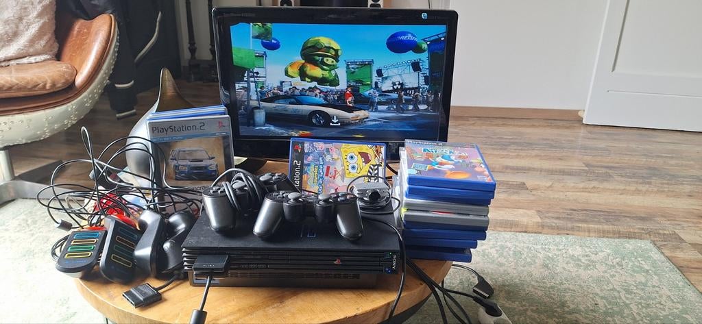 Playstation 2 fat met 2 controllers 16 x games en alle kabel, Ophalen of Verzenden, Sony, Gebruikt