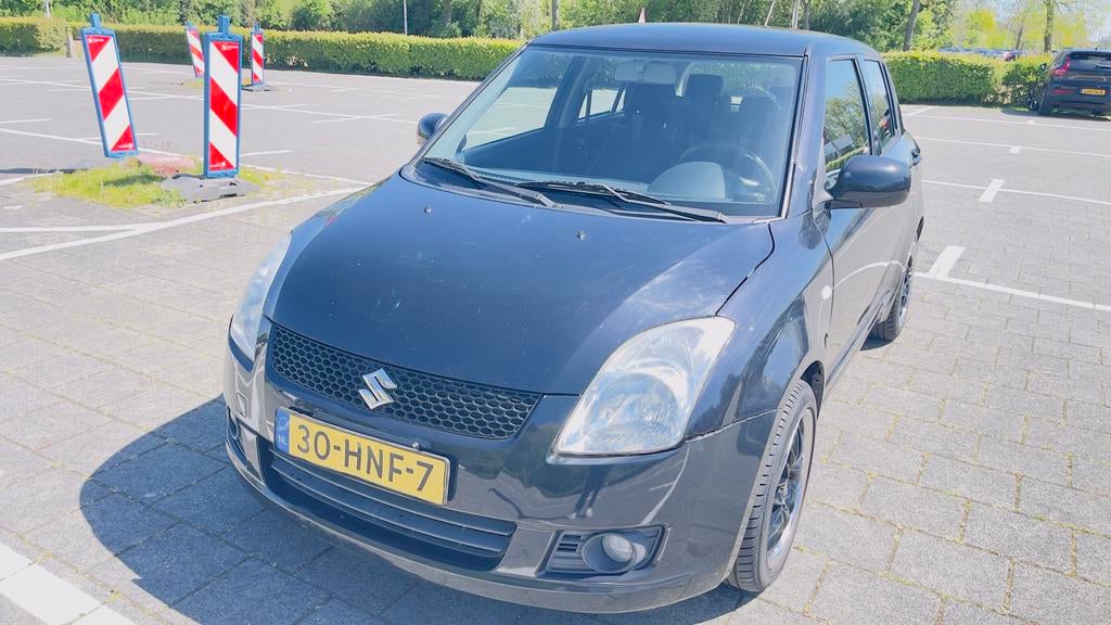 Suzuki Swift 1.3 5DRS 2009 Zwart, Auto's, Voorwielaandrijving, 40 €/maand, 400 kg, Origineel Nederlands