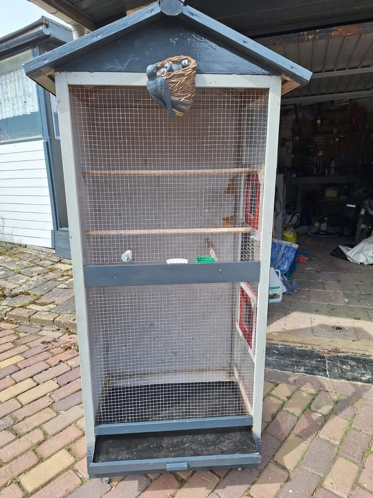 Kleine  vogel volaire, Ophalen, Hout, Vogelkooi