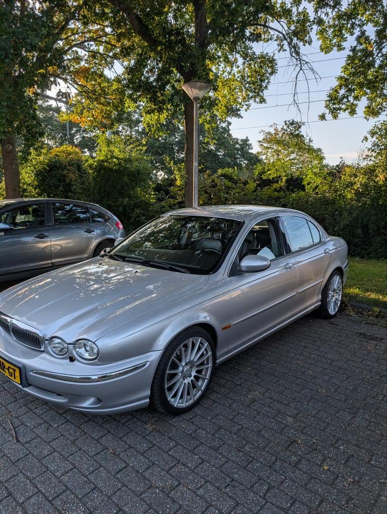 Jaguar X-Type 2.5 V6 Executive AUT 4WD 2001 Grijs, Auto's, Jaguar, Automaat, 196 pk, Zwart, 2495 cc