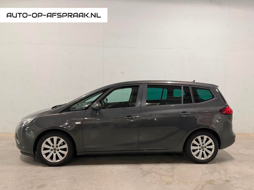Opel Zafira Tourer 1.4 Cosmo 7p. Navi Camera Airco Trekhaak, Auto's, Opel, Stof, Gebruikt, Euro 6, 7 stoelen