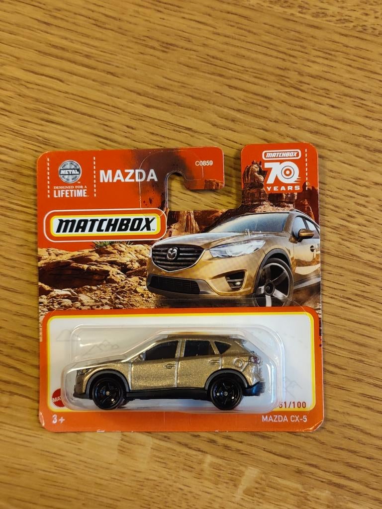 Matchbox Mazda CX-5 GOUD, Hobby en Vrije tijd, Modelauto's | Overige schalen, Ophalen of Verzenden, Auto