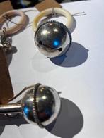 Verzilverde rammelaars, Ophalen, Zilver