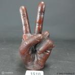 Online Veiling: Ijzeren hand