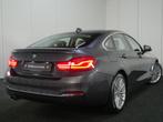 BMW 4 Serie Gran Coupé 420i High Executive Luxury Line Auto, Auto's, BMW, Te koop, Zilver of Grijs, 1515 kg, Benzine