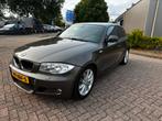 BMW 1-Serie 2.0 D 120 5DR AUT 2009 Bruin, Achterwielaandrijving, 1995 cc, Zwart, 4 cilinders