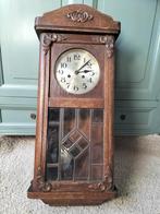 Antieke wandklok met slinger van F. Mauthe, Ophalen