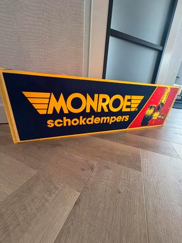 Monroe schokdemper lichtbak / lichtreclame met klok beschikbaar voor biedingen