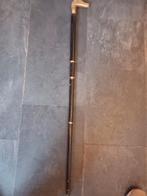 Antieke wandelstok met verborgen compartiment, Ophalen