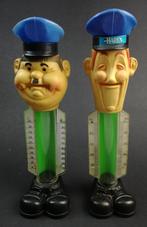 Stan Laurel & Oliver Hardy 2x Spaarpot / Spaarbuis, Verzamelen, Spaarpotten, Verzenden, Gebruikt, Kunststof, Strip- of Tekenfilmfiguur