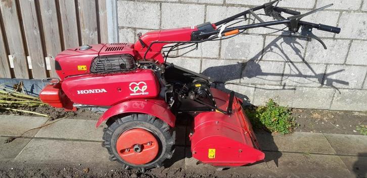 Nette Honda F810 tuinfrees met ploeg en cultivator/schoffel, Tuin en Terras, Hand-tuingereedschap, Gebruikt, Ophalen