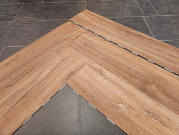 60m² | XL Visgraat (Klik PVC) Bruin eiken (Almere Poort) beschikbaar voor biedingen