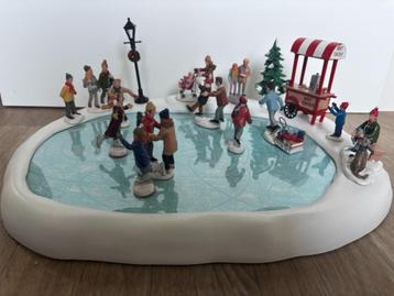 Lemax schaatsbaan figuur beweging- muziek  beschikbaar voor biedingen