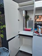 Witte kast met deuren, Ophalen