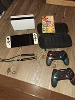 Nintendo Switch Oled, Switch OLED, Met games, Met 2 controllers, Ophalen of Verzenden