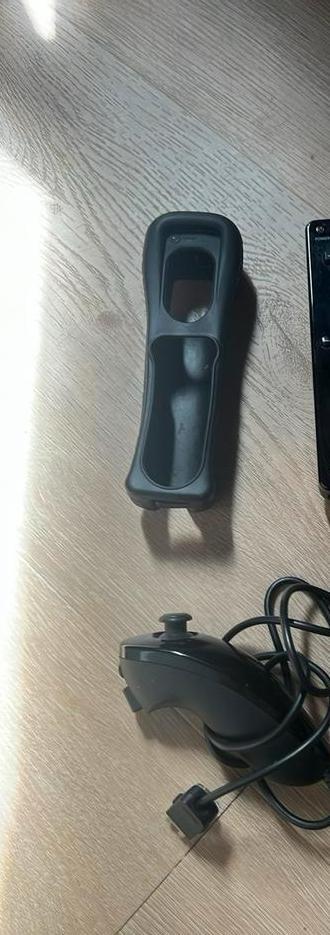 Bundel!! nunchuck + beschermhoes beschikbaar voor biedingen
