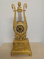 Bronzen vuur vergulde lier pendule, Ophalen