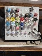 Porseleinen deurknopjes, Ophalen