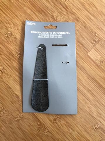 Ergonomische schoenlepel beschikbaar voor biedingen