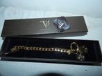Tov Essentials schakkel armband bedels munten eraan in doos