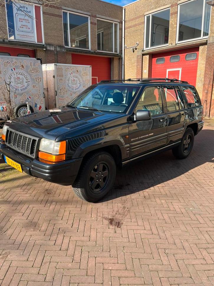 Jeep Grand Cherokee 5.9 I V8 Limited AUT 1998 Zwart lpg, Auto's, Jeep, Particulier, Benzine, SUV of Terreinwagen, Automaat, Origineel Nederlands
