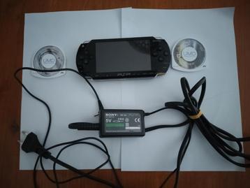 Sony PSP met oplader en 2 spellen  beschikbaar voor biedingen